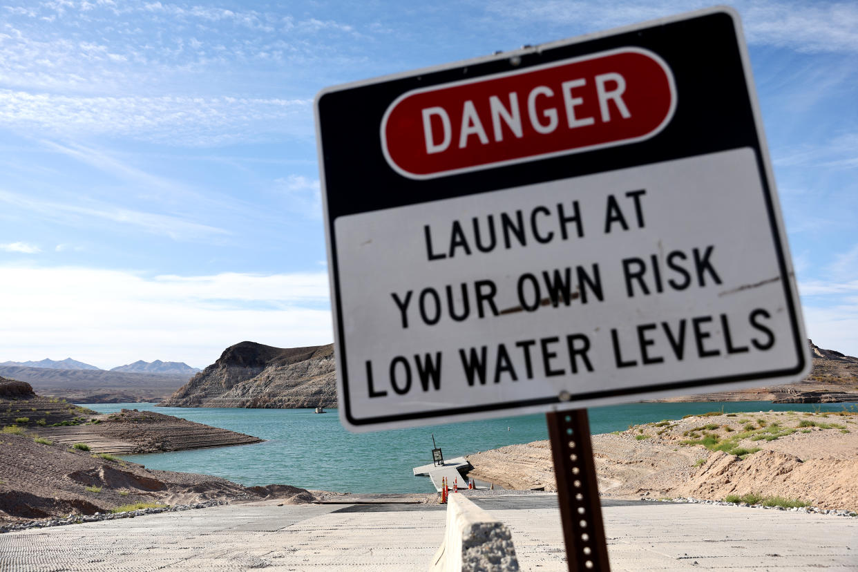 A sign near a faltering boat launch ramp that is set to be relocated due to lowering water levels on Lake Mead. 