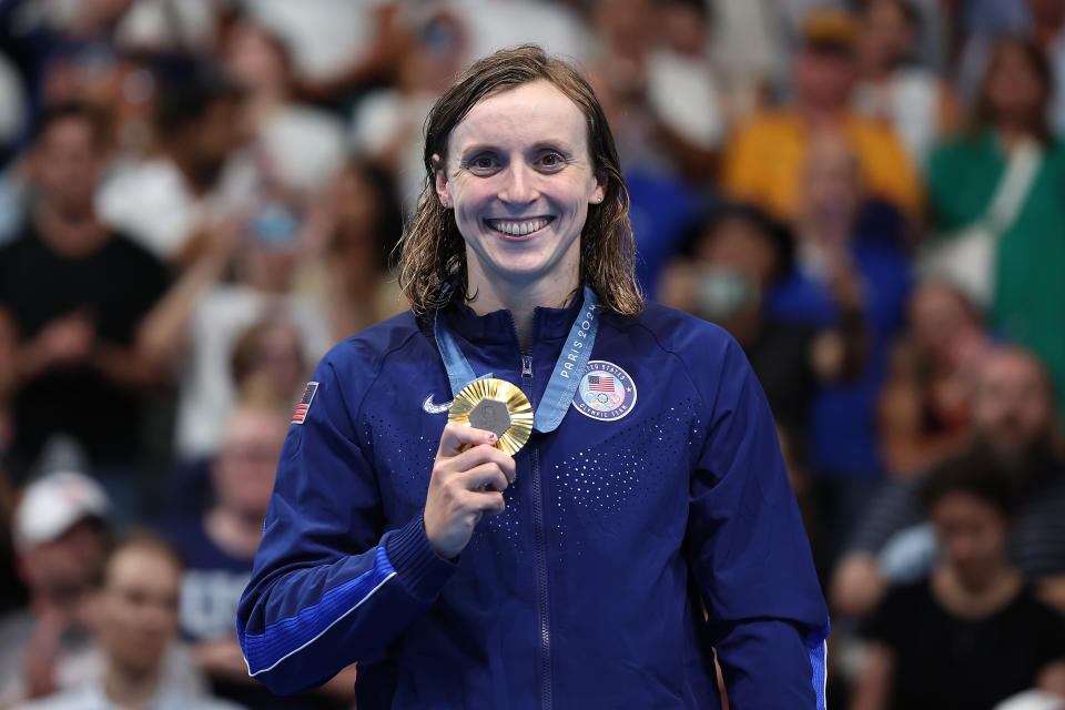 NANTERRE, FRANCE - AUGUST 03: Gold Medalist Katie Ledecky of Team United States poses on the podium during the Swimming medal ceremony after the Women's 800m Freestyle Final on day eight of the Olympic Games Paris 2024 at Paris La Defense Arena on August 03, 2024 in Nanterre, France. (Photo by Quinn Rooney/Getty Images)