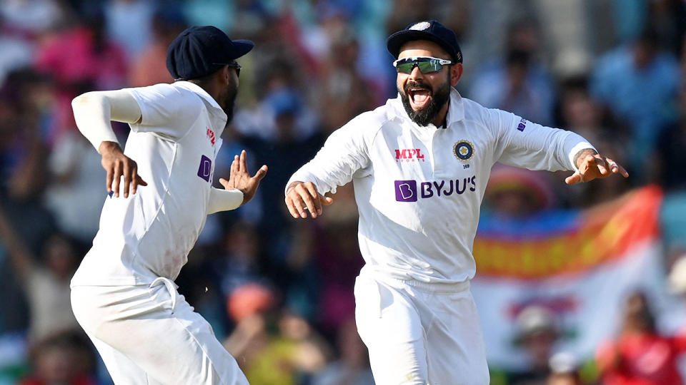 Pictured here, Virat Kohli celebrates India's fourth Test victory against England. 