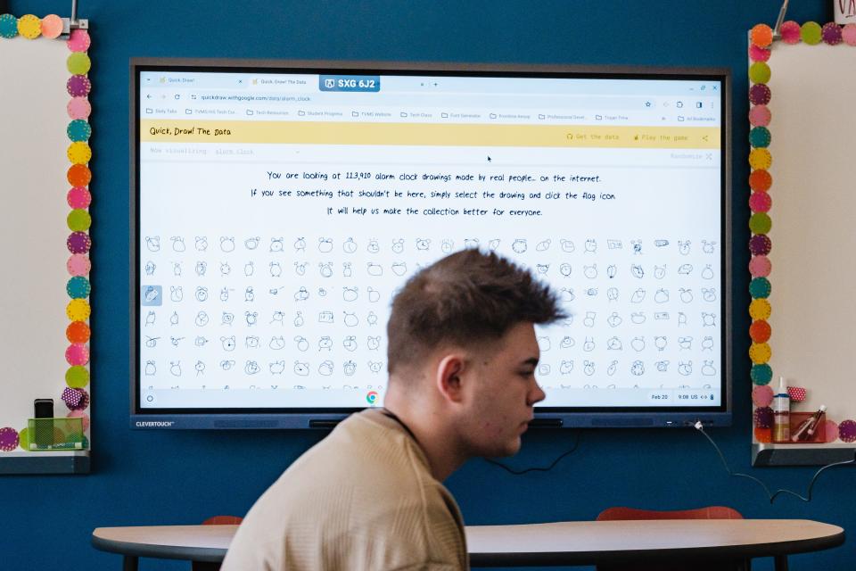 Tanner Wood, 15, a freshman at Tuscarawas Valley Middle-High School, sits in front of an artificial intelligence program prompt instructing the user to identify potential errors related to drawings of alarm clocks. Wood is one of three students currently taking Tiffany Shaw's class on AI at Tusky Valley.