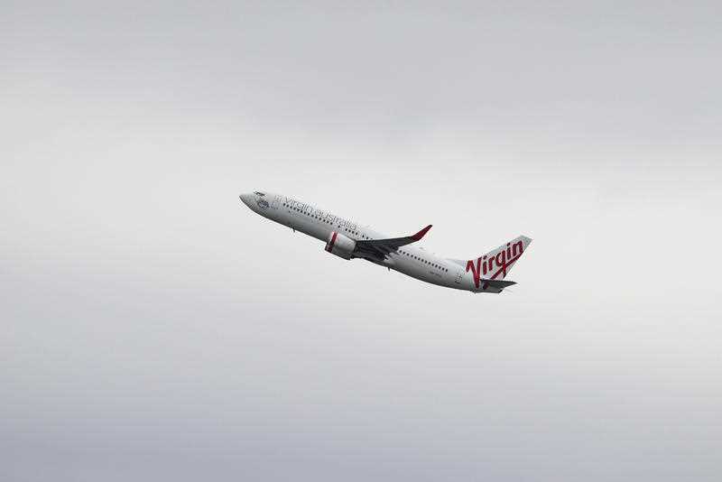 A Virgin Australia Airlines Boeing 737-800 plane takes off from Sydney Airport in Sydney.