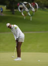 Aditi Ashok, of India, makes a putt on the 16th hole during the final round of the women's golf event at the 2020 Summer Olympics, Saturday, Aug. 7, 2021, at the Kasumigaseki Country Club in Kawagoe, Japan. (AP Photo/Andy Wong)