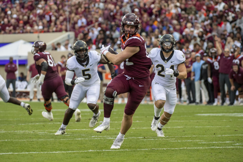 Virginia Tech's Benji Gosnell (82) runs with the ball after a catch against Wake Forest during the first half of an NCAA college football game, Saturday, Oct. 14, 2023, in Blacksburg, Va. (AP Photo/Robert Simmons)