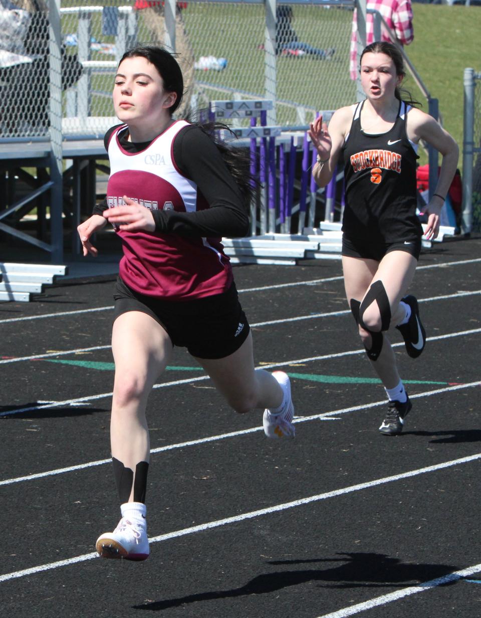 Freshman Lauren Hammond (left) has made an immediate impact for Charyl Stockwell's track and field team.