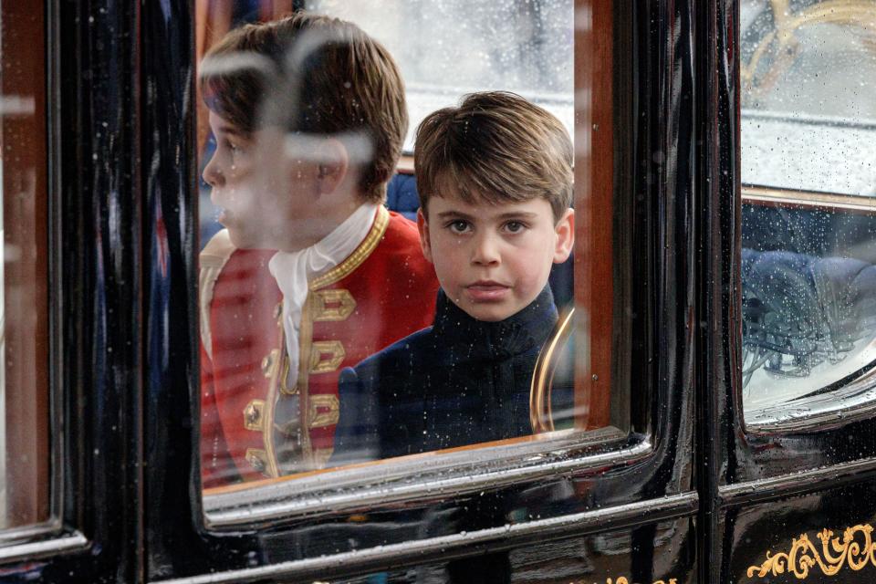 <p>Britain's Prince Louis of Wales (R) and his brother Britain's Prince George of Wales depart following the Coronation Ceremony for Britain's King Charles III and Queen Camilla in Westminster Abbey in central London, on May 6, 2023. - The set-piece coronation is the first in Britain in 70 years, and only the second in history to be televised. Charles will be the 40th reigning monarch to be crowned at the central London church since King William I in 1066. Outside the UK, he is also king of 14 other Commonwealth countries, including Australia, Canada and New Zealand. (Photo by Rob Pinney / POOL / AFP) (Photo by ROB PINNEY/POOL/AFP via Getty Images)</p> 