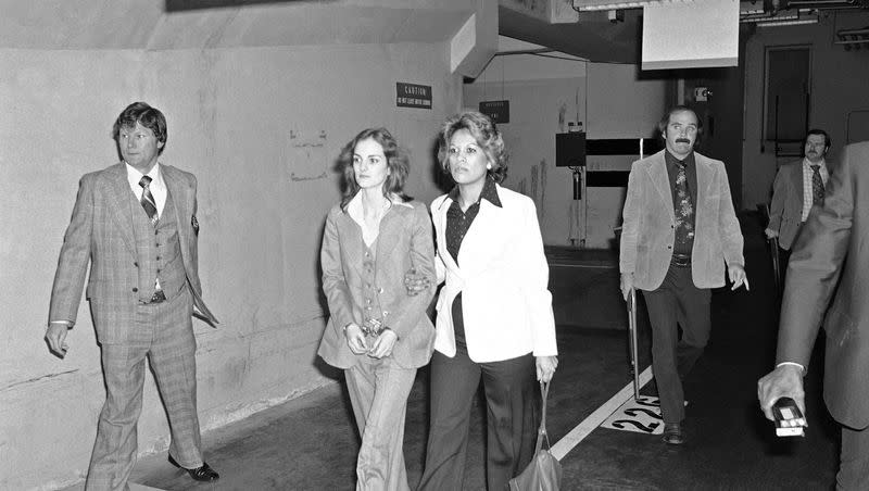 Patty Hearst is escorted to an elevator by a deputy U.S. Marshal in the basement of San Francisco’s Federal Building, April 12, 1976. “Stockholm Syndrome” is most famously attached to Patty Hearst’s kidnapping and subsequent participation in her kidnappers’ crimes.