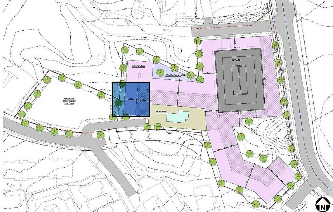 A concept plan shows what could be proposed for 200 S. Elliott Road, currently home to the nonprofit organization Extraordinary Ventures. The initial plan calls for roughly 330 apartments and a 495-space parking deck, with space for a small park.