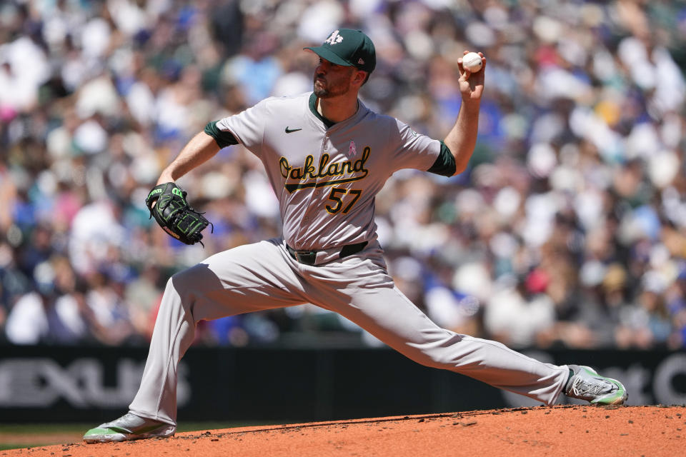 Oakland Athletics starting pitcher Alex Wood throws against the Seattle Mariners during the first inning of a baseball game Sunday, May 12, 2024, in Seattle. (AP Photo/Lindsey Wasson)