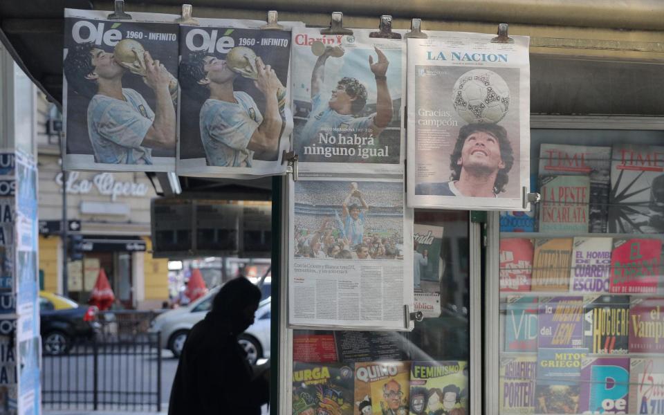 newspapers showing maradona - Getty