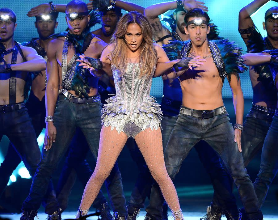 J.Lo made sure all eyes were on her when she took to the stage wearing a metallic silver number and bejeweled nude fishnet tights to perform at the Q'Viva! The Chosen Live show in Las Vegas on May 26, 2012.