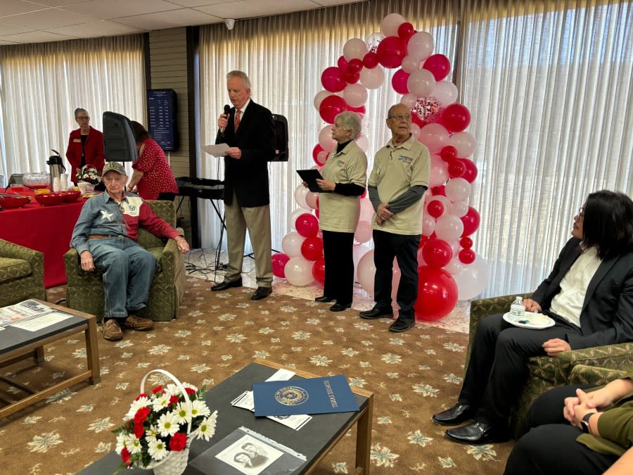 Penny and John Hawkins receiving awards on behalf of the Cherokeean Herald