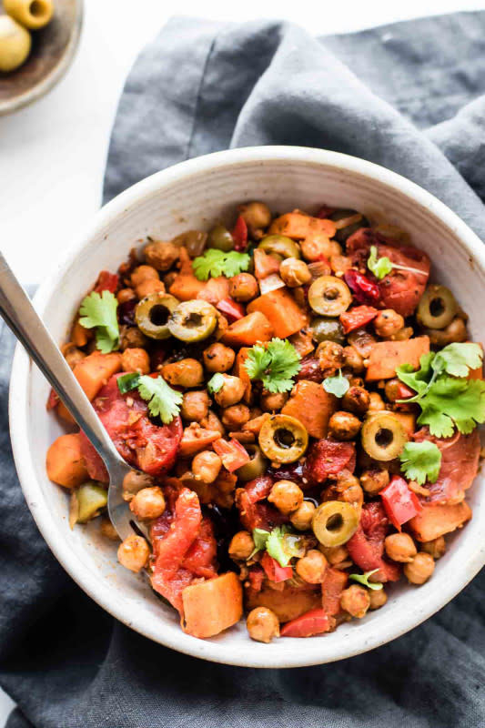 <p>Cotter Crunch</p><p>A wholesome Latin-inspired vegan meal is the perfect combo of sweet and savory with stewed tomatoes, roasted chickpeas, sweet potatoes, olives, raisins, and spices.</p><p><strong>Get the recipe: <a href="https://www.cottercrunch.com/cuban-sweet-potato-picadillo-vegan/" rel="nofollow noopener" target="_blank" data-ylk="slk:Cuban Sweet Potato Picadillo Bowls;elm:context_link;itc:0;sec:content-canvas" class="link ">Cuban Sweet Potato Picadillo Bowls</a></strong></p>