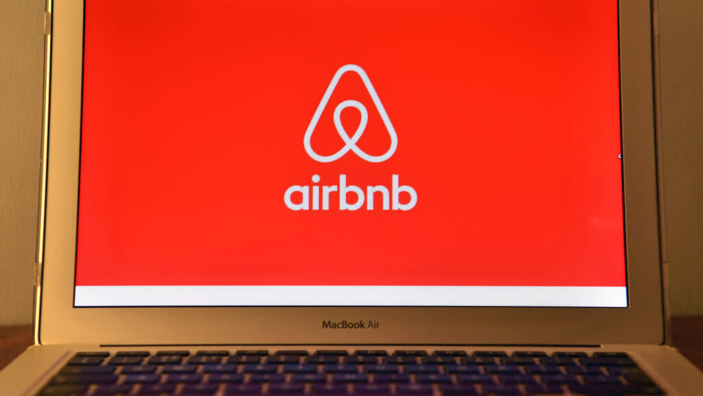 Airbnb logo on computer screen