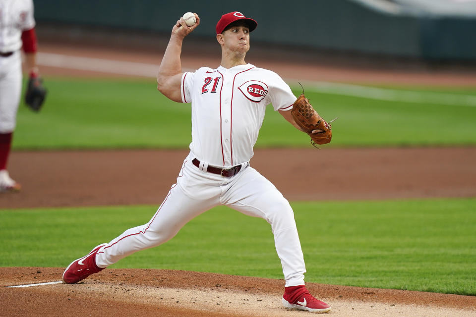 Cincinnati Reds' Michael Lorenzen pitches in the first inning of the team's baseball game against the against the Pittsburgh Pirates in Cincinnati, Tuesday, Sept. 15, 2020. (AP Photo/Bryan Woolston)