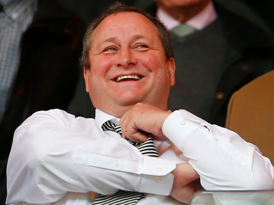 Newcastle owner Mike Ashley (R) in the stands with Managing Director Lee Charnley