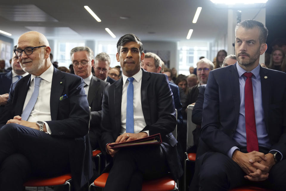 British Prime Minister Rishi Sunak, centre, attends a speech on national security at the Policy Exchange, in London, Monday May 13, 2024. (Carl Court/Pool via AP)