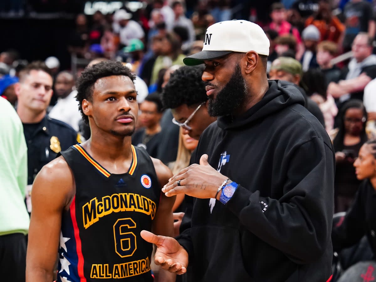 Bronny James #6 of the West team talks to Lebron James of the Los Angeles Lakers after the 2023 McDonald's High School Boys All-American Game at Toyota Center on March 28, 2023 (Getty Images)
