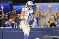 Los Angeles Rams wide receiver Cooper Kupp (10) stands in the end zone after scoring a touchdown during the second half of an NFL football game against the Tampa Bay Buccaneers Sunday, Sept. 26, 2021, in Inglewood, Calif. (AP Photo/Jae C. Hong)