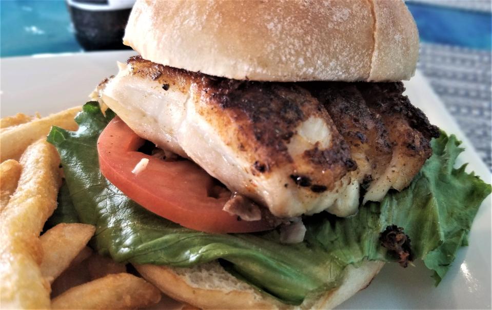 Deep Lagoon's red grouper sandwich, which I had blackened, priced at $33. The Osprey restaurant also offers a smaller, $16 red grouper sandwich on the "light lunch" menu.