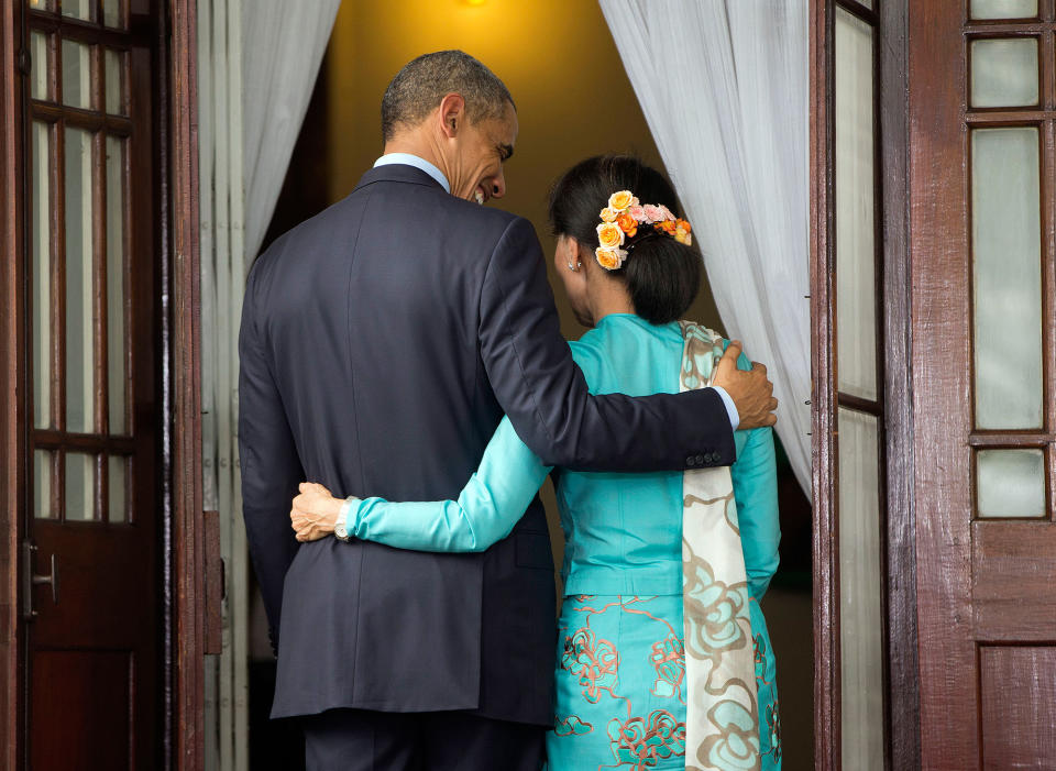 <p>President Barack Obama, left, and Myanmar’s opposition leader Aung San Suu Kyi, right, walk back to her home following the conclusion of their joint news conference in Yangon, Myanmar Friday, Nov. 14, 2014. (AP Photo/Pablo Martinez Monsivais) </p>