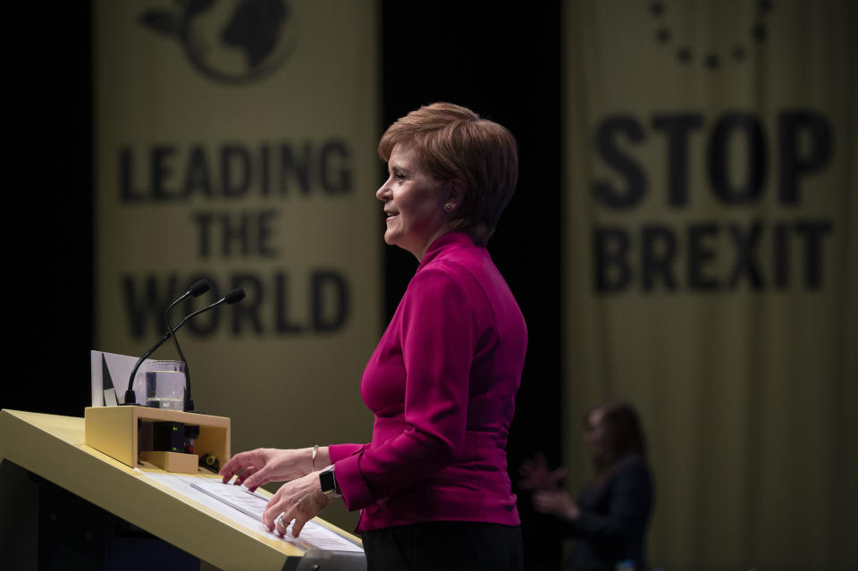 First Minister of Scotland Nicola Sturgeon delivers her keynote speech to delegates during the Scottish National Party (SNP) autumn conference in Aberdeen, Scotland, Tuesday Oct. 15, 2019. The SNP is a major regional force in the Brexit debate throughout the United Kingdom. (Jane Barlow/PA via AP)