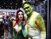 <p>Cosplayers dressed as Poison Ivy and Killer Croc from <i>Batman</i> at Comic-Con International on July 21, 2018, in San Diego. (Photo: Angela Kim/Yahoo Entertainment) </p>