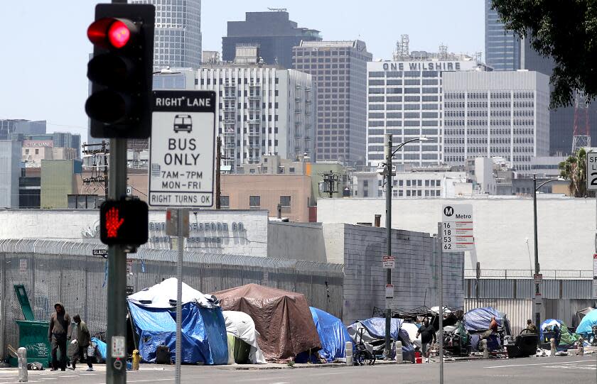 Los Angeles, CA - Tents that serve as shelter for homeles people line the sidewalk along FGifth Street in downtown Los Angeles. The homeless population continued to rise dramatically in the last year, increasing by 9% in Los Angeles County and 10% in the city of Los Angeles. Efforts to house people, which include hundreds of millions of dollars spent on shelter, permanent housing and outreach, have failed to stem the growth of street encampments, as reflected in the annual point-in-time count released Thursday, June 29, 2023, by the Los Angeles Homeless Services Authority. June 29: in Los Angeles on Thursday, June 29, 2023 in Los Angeles, CA. (Luis Sinco / Los Angeles Times)