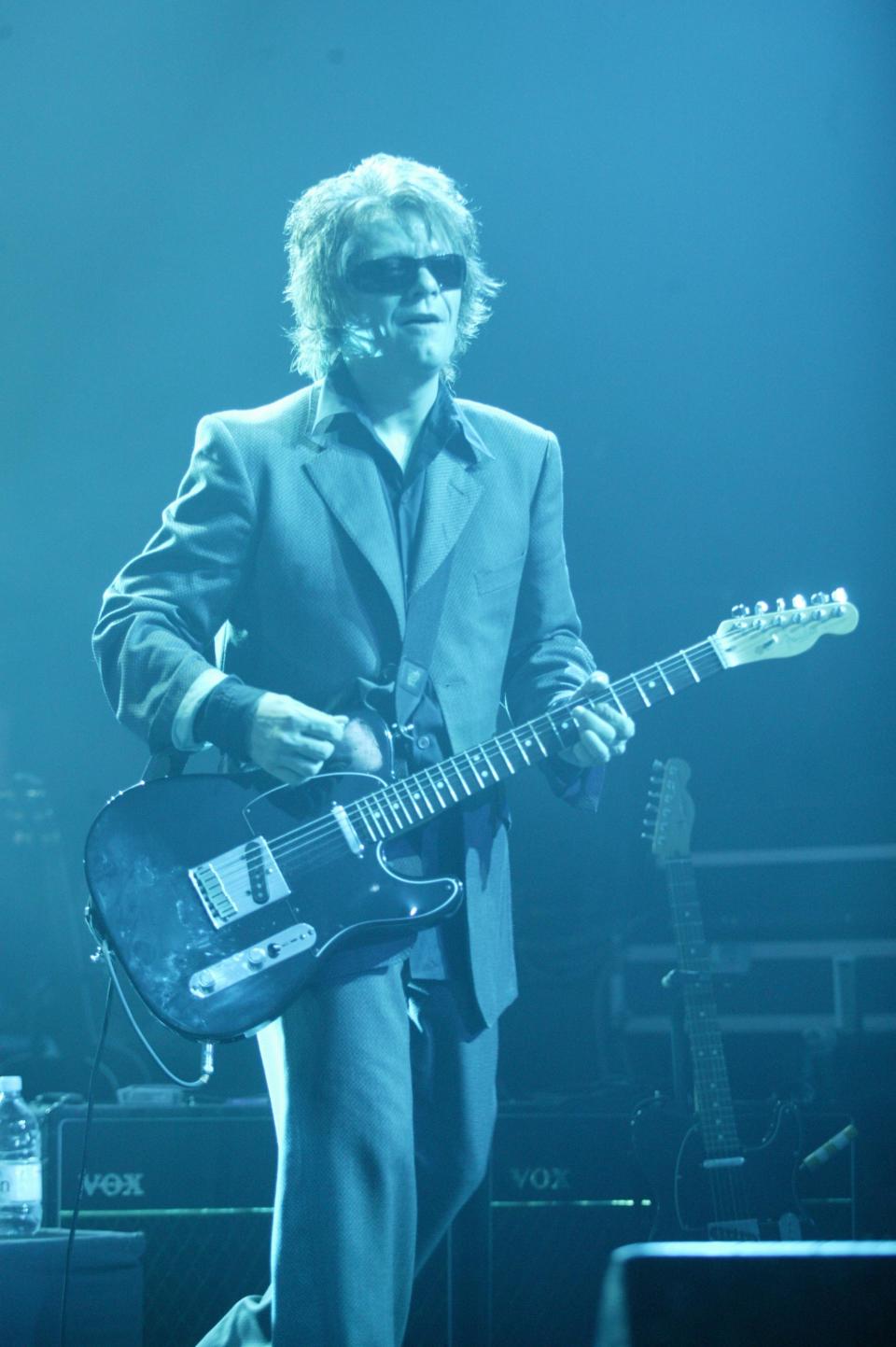 LONDON - OCTOBER 14: Andy Taylor from Duran Duran performs live at The Forum on October 14, 2003 in London, England. (Photo by Dave Hogan/Getty Images)