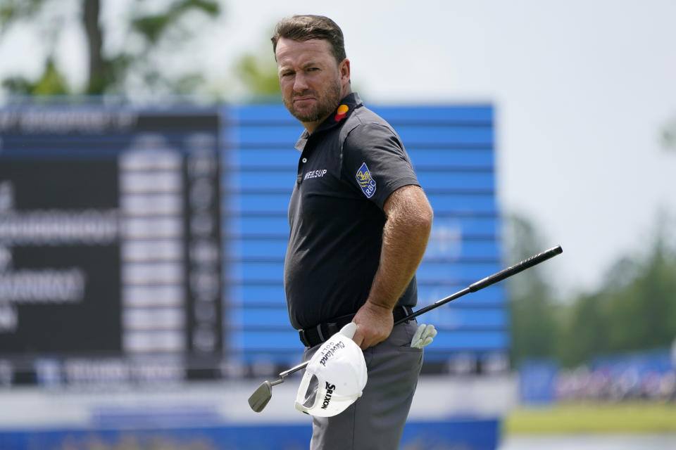 FILE - Graeme McDowell, of Northern Ireland, reacts after missing a putt on the 18th green during the second round of the PGA Zurich Classic golf tournament, Friday, April 22, 2022, at TPC Louisiana in Avondale, La. McDowell says he accepts it is “incredibly polarizing” to join the Saudi-funded rebel golf tour. He even offered a reason why, citing the 2018 murder of journalist Jamal Khashoggi in the Saudi consulate in Istanbul. (AP Photo/Gerald Herbert, File)