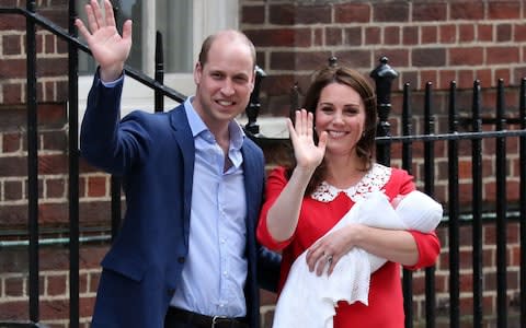 The Duke and Duchess of Cambridge with Prince Louis outside the Lindo Wing - Credit: ISABEL INFANTES /AFP