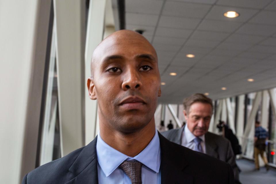 Minneapolis police officer Mohamed Noor leaves the Hennepin County Government Center.