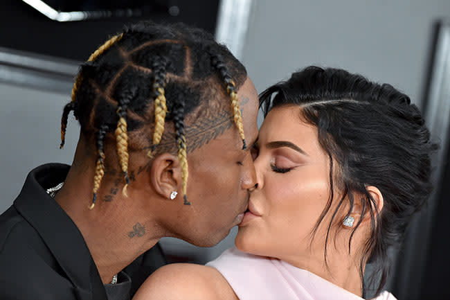 Kylie and Travis kiss on the red carpet