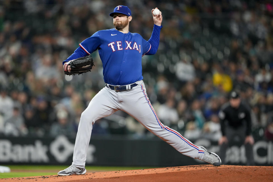 Texas Rangers starting pitcher Jordan Montgomery throws to a Seattle Mariners batter during the first inning of a baseball game Thursday, Sept. 28, 2023, in Seattle. (AP Photo/Lindsey Wasson)