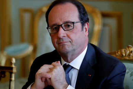 French President Francois Hollande attends a meeting at the Elysee Palace in Paris, France, April 13, 2016. REUTERS/Philippe Wojazer/File Photo