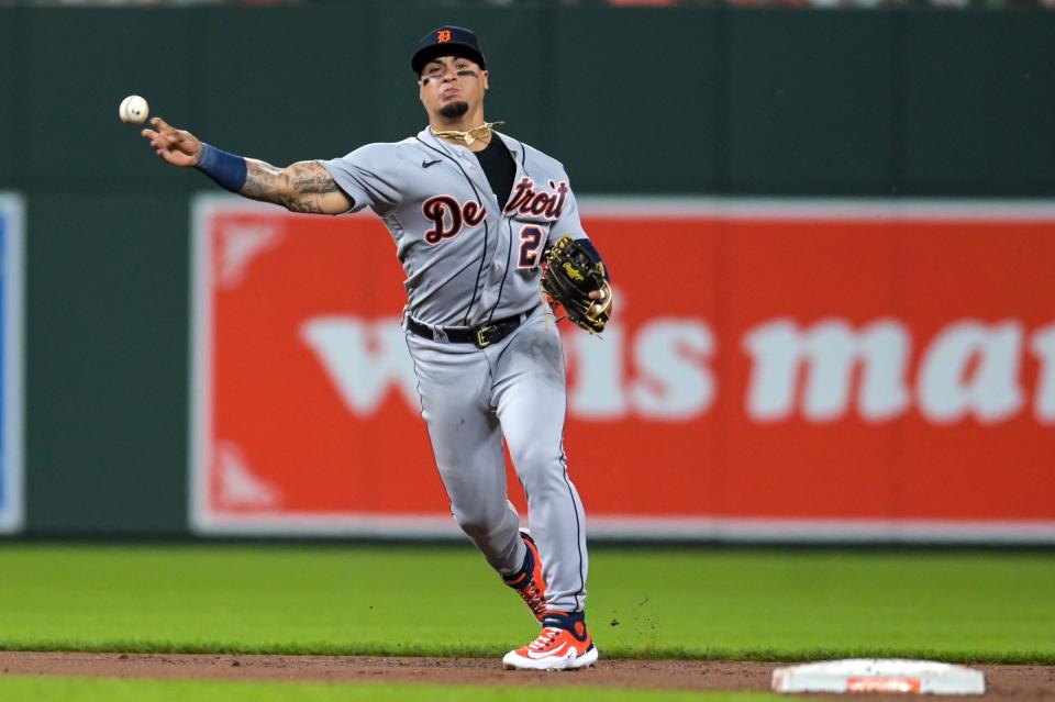 Tigers shortstop Javier Baez throws to first base during the eighth inning of the Tigers' 2-1 loss on Friday, April 21, 2023, in Baltimore.