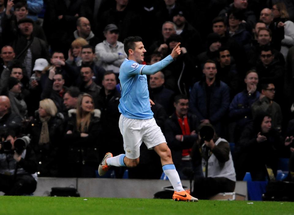 Manchester City's Stevan Jovetic celebrates after scoring against Chelsea during their English FA Cup fifth round soccer match between Manchester City and Chelsea at The Etihad Stadium, Manchester, England, Saturday, Feb. 15, 2014. (AP Photo/Rui Vieira)