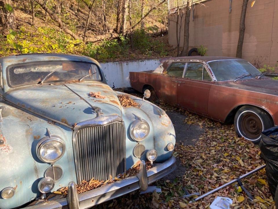 Two cars Milwaukee Journal Sentinel reporters were told belong to City Attorney Tearman Spencer sit at a North King Drive property, where city inspectors were told by the property owner that he did not need an occupancy permit because he had a letter from the City Attorney's Office that exempted him.