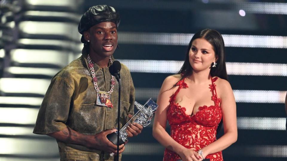 Man holding a music award, 12 September