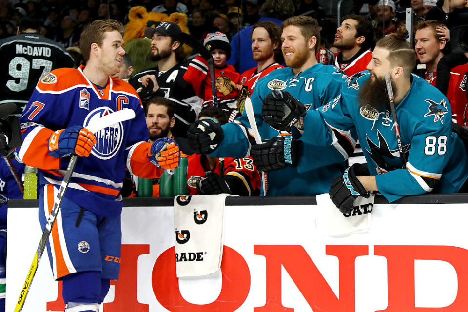 LOS ANGELES, CA – JANUARY 28: Connor McDavid #97 of the Edmonton Oilers reacts with Joe Pavelski #8 of the San Jose Sharks and Brent Burns #88 of the San Jose Sharks in the Discover NHL Shootout during the 2017 Coors Light NHL All-Star Skills Competition as part of the 2017 NHL All-Star Weekend at STAPLES Center on January 28, 2017 in Los Angeles, California. (Photo by Bruce Bennett/Getty Images)