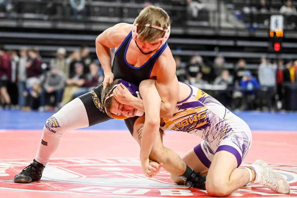 Watertown's Sloan Johannsen, right, wrestles Aberdeen Central's Rayden Zens in the 126-pound championship match the Rapid City Invitational on Saturday, Dec. 9, 2023 at Summit Arena at The Monument.