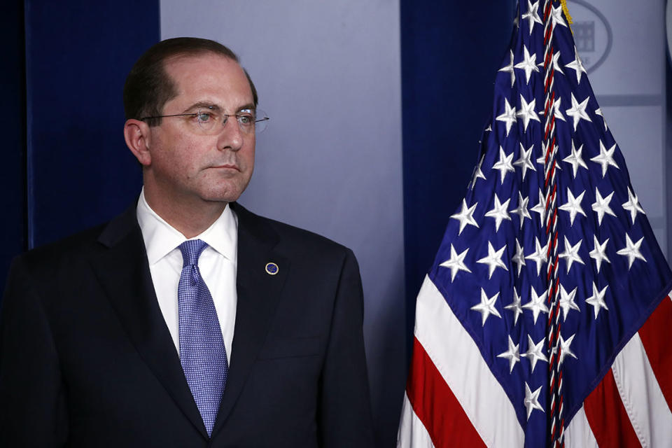 Health and Human Services Secretary Alex Azar listens as President Donald Trump speaks about the coronavirus in the James Brady Press Briefing Room of the White House, Friday, April 3, 2020, in Washington. (AP Photo/Alex Brandon)