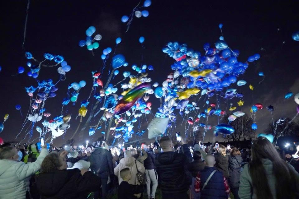 People release balloons in Sutton, in memory of brothers Kyson and Bryson, aged four, and Leyton and Logan, aged three, who died in a fire at their home in Collingwood Road, Sutton, south London, on December 16. Picture date: Thursday December 23, 2021. (PA Wire)