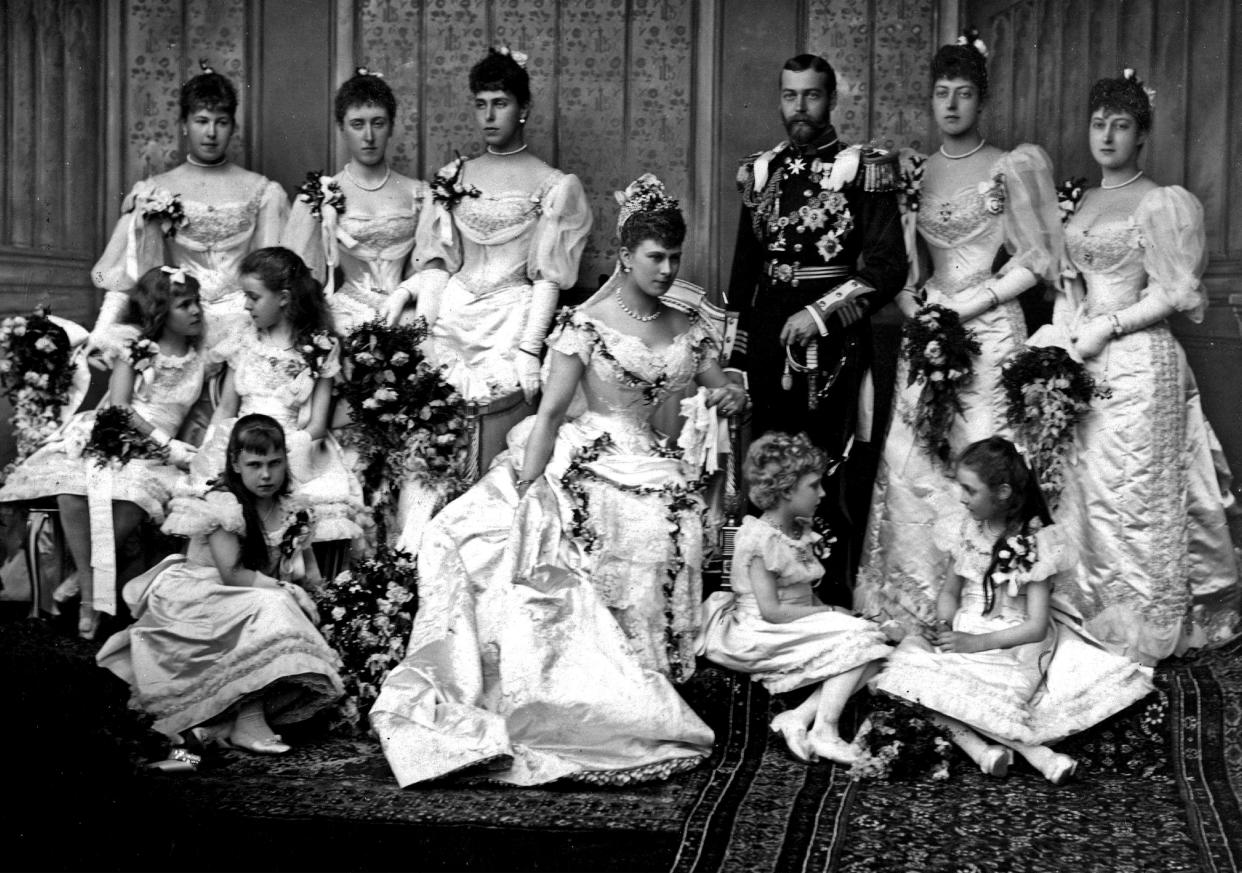 Portrait photograph in Buckingham Palace from the wedding of King George V and Princess Mary of Teck. Showing the family all posed in a group in their wedding clothes. Photograph taken in 1893. (Photo by: Universal History Archive/Universal Images Group via Getty Images)