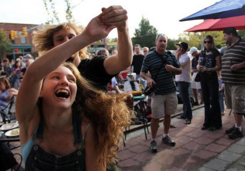 Nicholas, 18, and Ashley Amodei, 17, of Chapel Hill dance to Saints Apollo during the 15th annual Carrboro Music Festival. People often mistake the brother-sister pair for a couple. This year’s festival kicks off Saturday afternoon on the Town Commons and continues from 1 p.m. to midnight Sunday at more than two dozen locations around town.