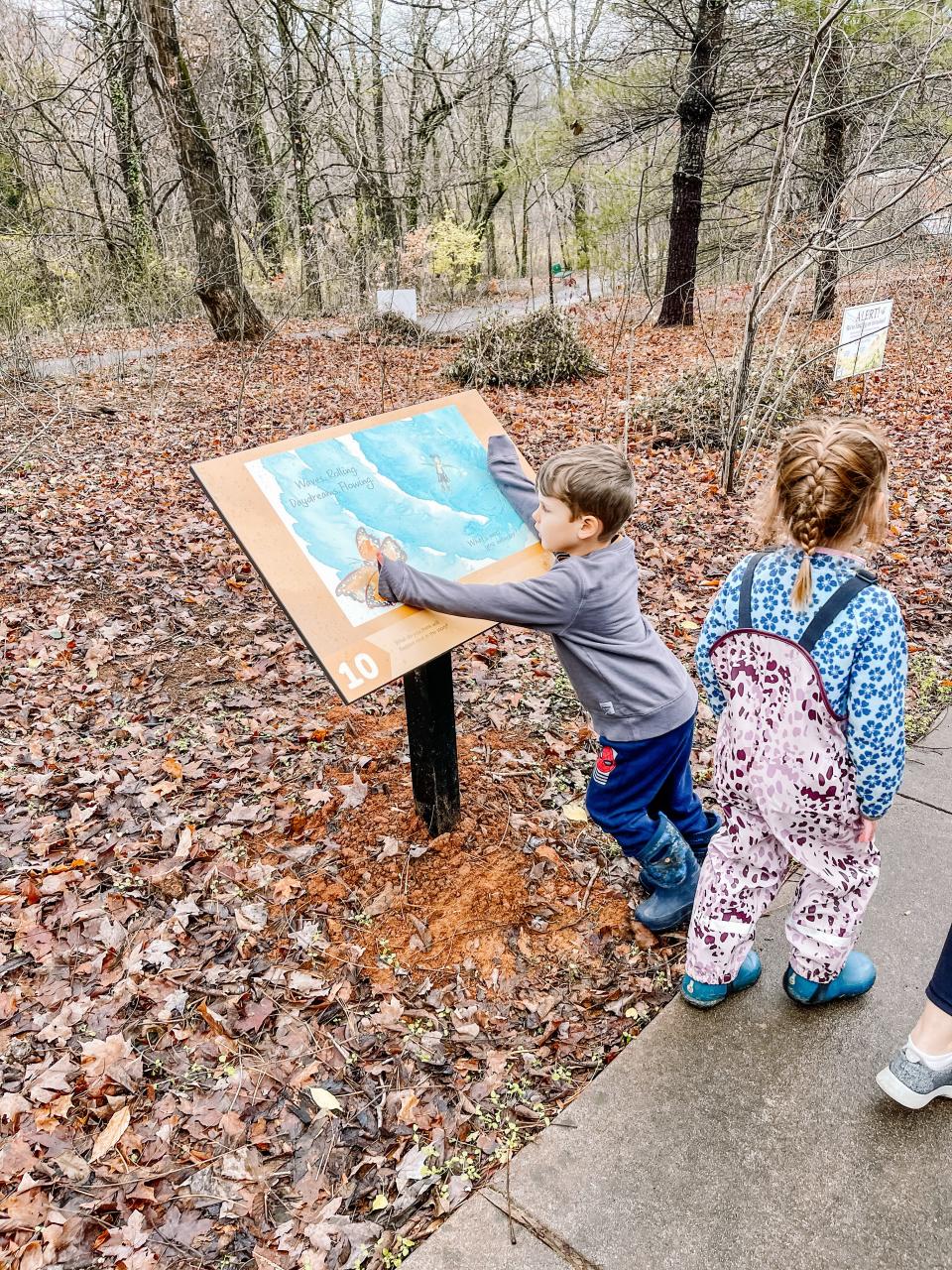 Public Library Storybook trail at Ijams Nature Center features “Run Wild” by David Covell, a story celebrating nature and a carefree spirit. Nov. 30, 2022.