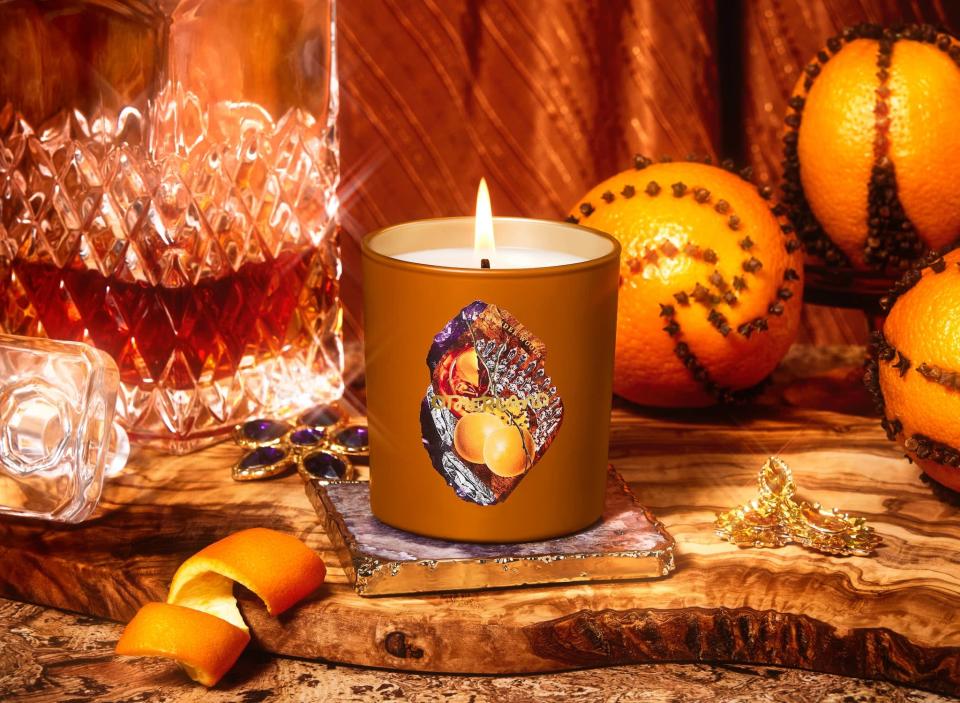 <p>Embrace the spice and warmth this season with the <span>Otherland Adorned Pomander Woods</span> ($36) candle. It has notes of honeybell orange, toasted cloves, and dark mahogany.</p>