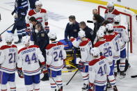 Montreal Canadiens' Jake Evans is taken off the ice on a stretcher after getting hit by Winnipeg Jets' Mark Scheifele during the third period of Game 1 of an NHL hockey Stanley Cup second-round playoff series Wednesday, June 2, 2021, in Winnipeg, Manitoba. (John Woods/The Canadian Press via AP)