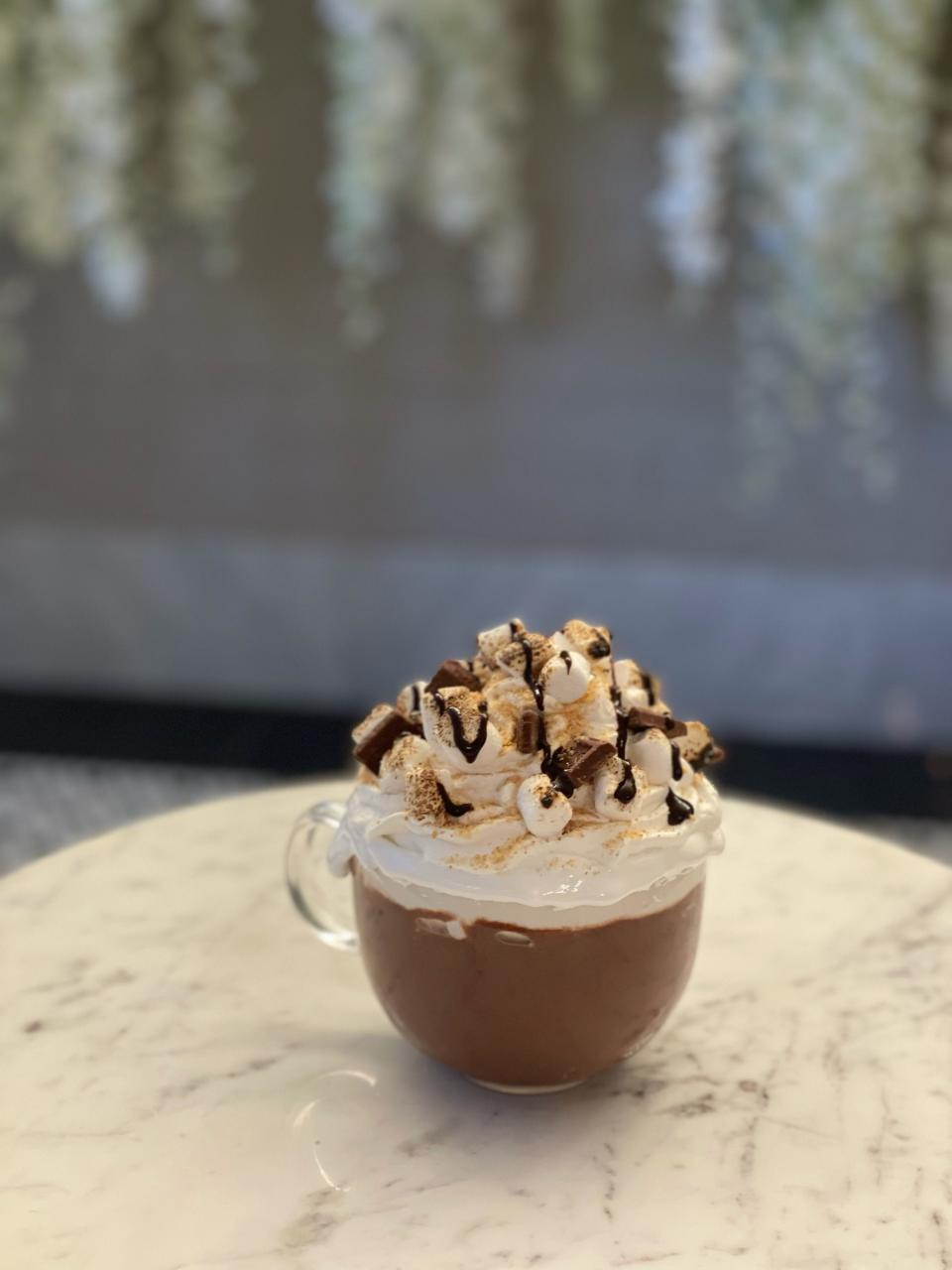 This S'more Hot Chocolate, loaded with whipped cream, marshmallows, chocolate sauce and graham cracker crumbs, can be found at the Sugar Factory.