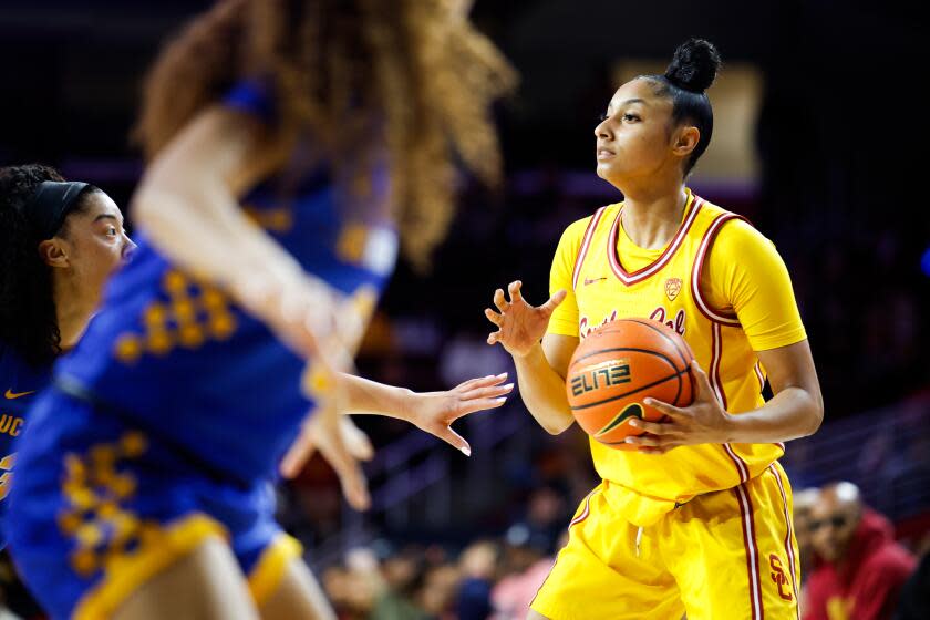 Los Angeles, CA - December 10: USC Trojans guard JuJu Watkins (12) looks to pass the ball.