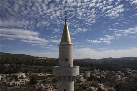 One of four minarets of a new mosque is seen in the Israeli-Arab village of Abu Ghosh, near Jerusalem November 22, 2013. REUTERS/Ronen Zvulun